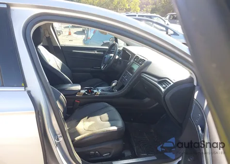 2016 Ford Fusion Titanium z USA, uszkodzony, nr VIN 3FA6P0D97GR138228